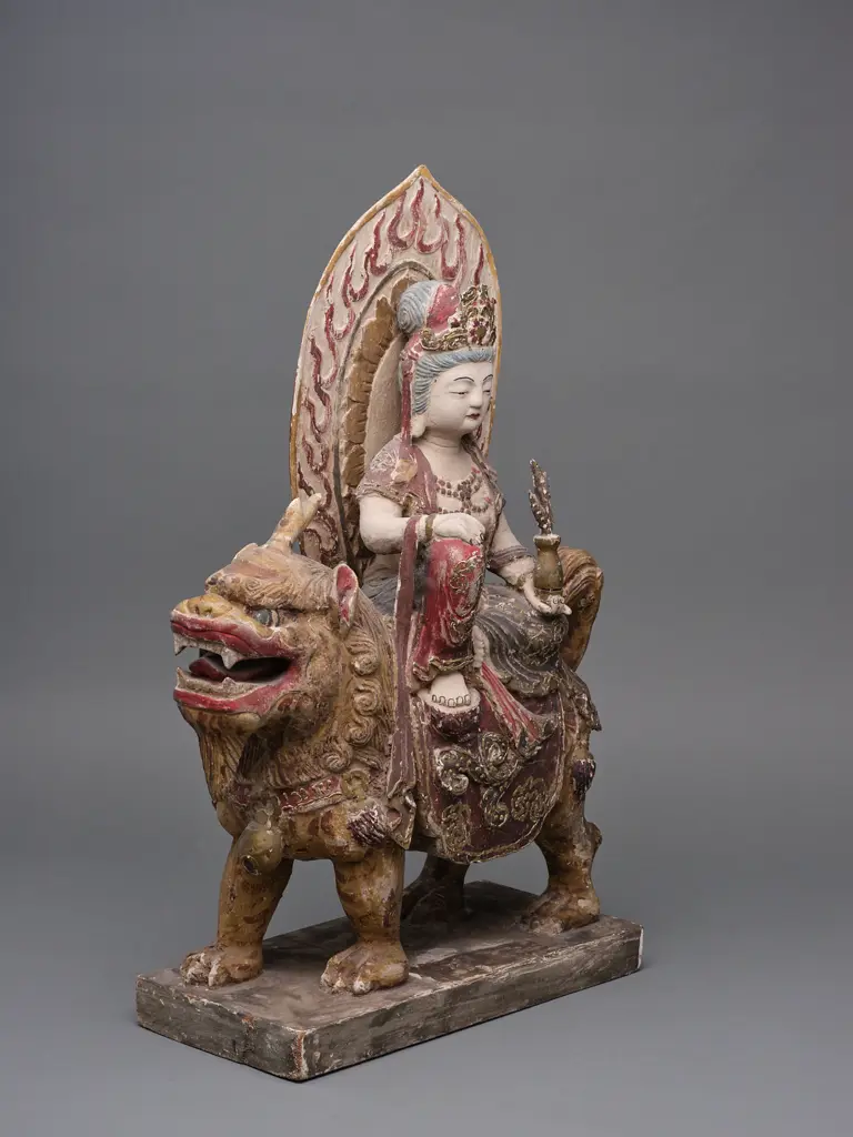 Chinese wood and gesso Buddha figure seated on mythological lion dog, Image 1++